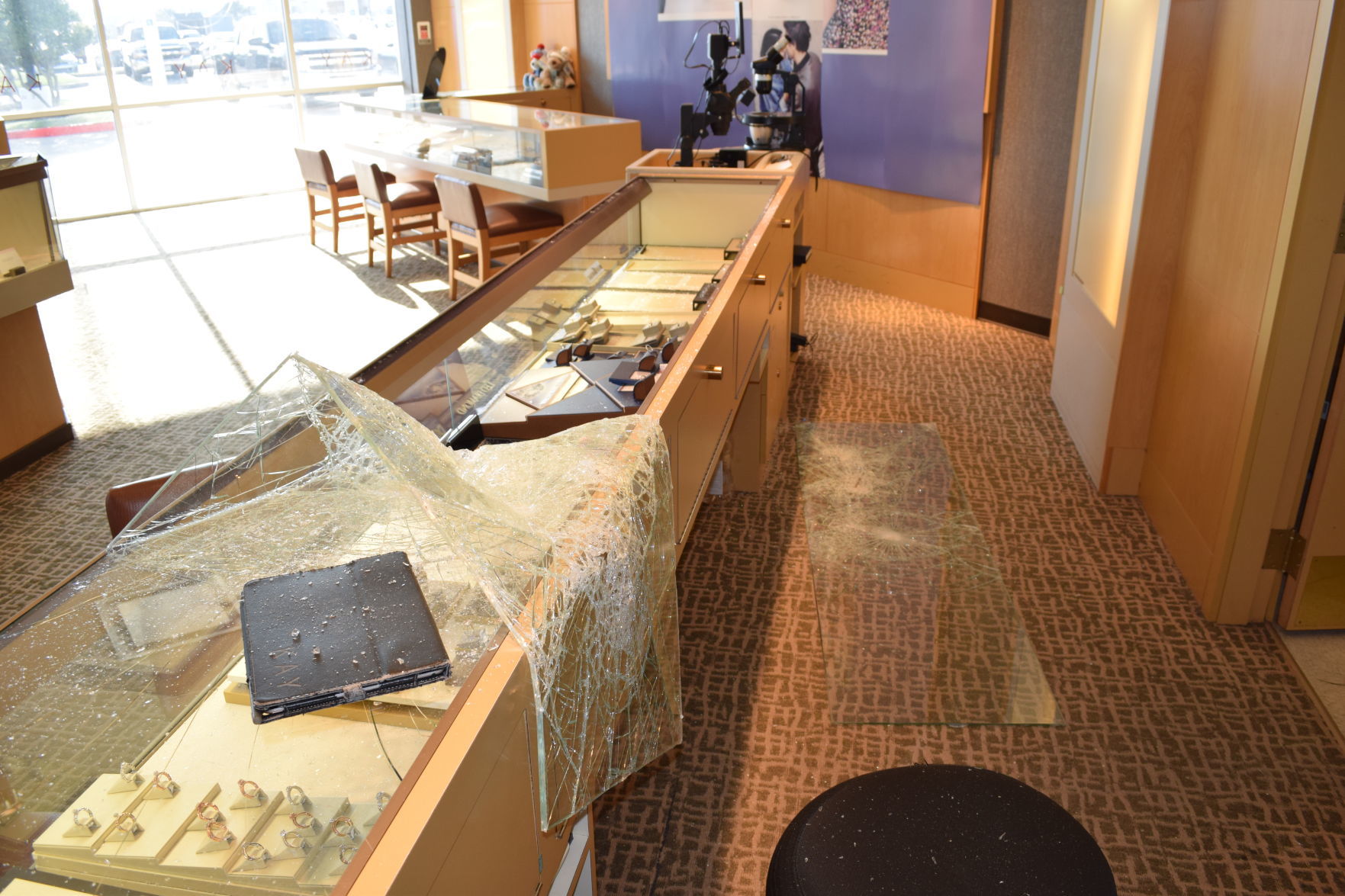 Smash and grab jewelry heist results in two arrests